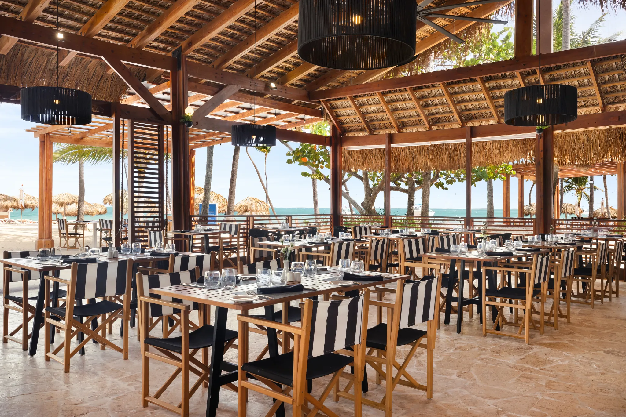 Blue Water Grill at Sunscape Coco Punta Cana featuring elegant outdoor dining, grilled specialties, and a tropical open-air ambiance.