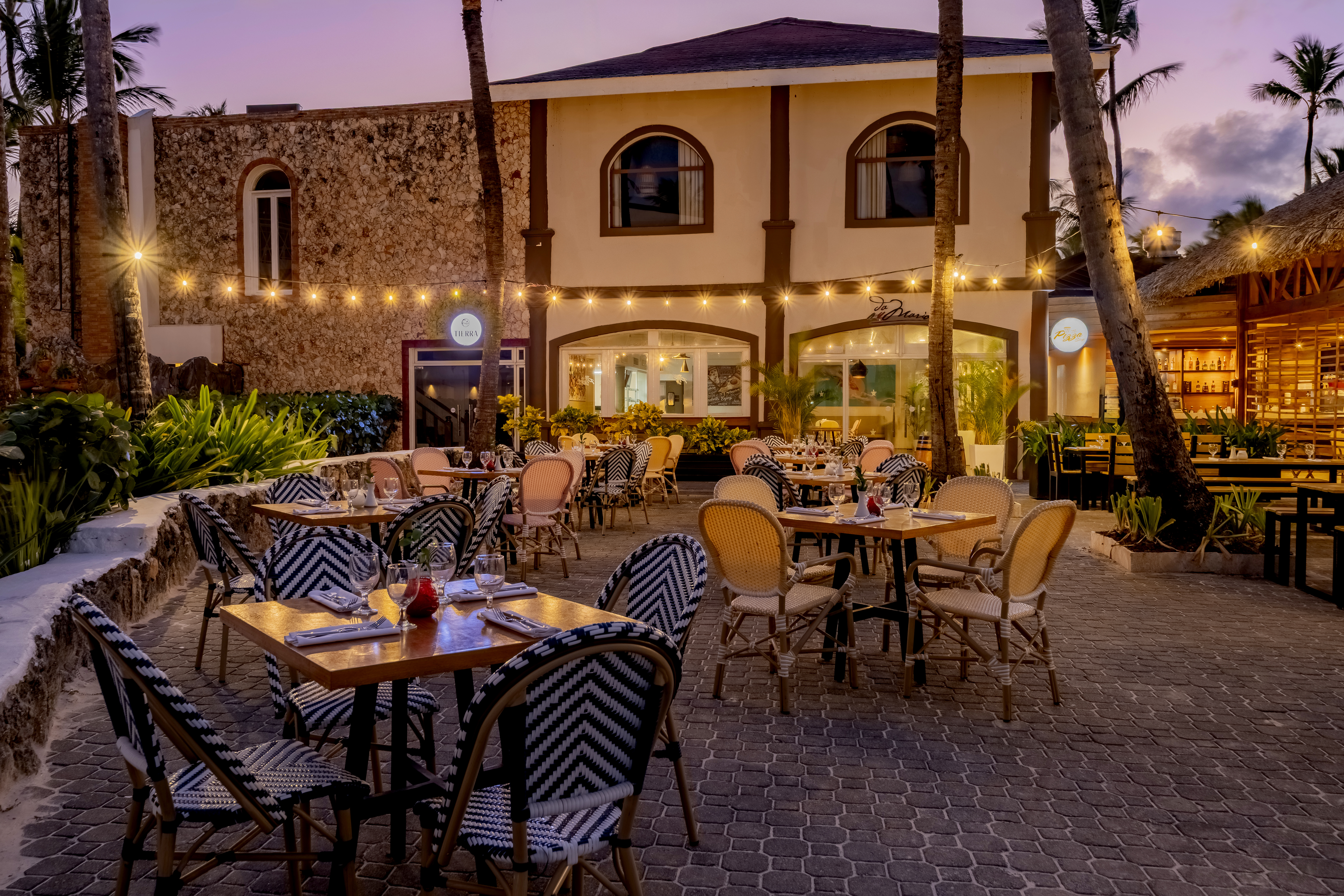 Da Mario restaurant at Sunscape Coco Punta Cana featuring classic Italian-inspired décor, elegant dining tables, and a warm family-friendly atmosphere.