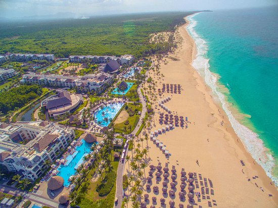 Hard Rock Hotel and Casino Punta Cana all-inclusive beachfront resort with large pools and entertainment venues.