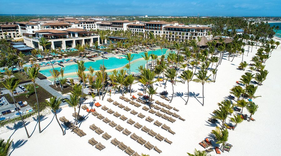 Lopesan Costa Bavaro Resort Spa & Casino luxury all-inclusive with expansive pools, modern architecture, full-service spa, and on-site casino in Punta Cana.