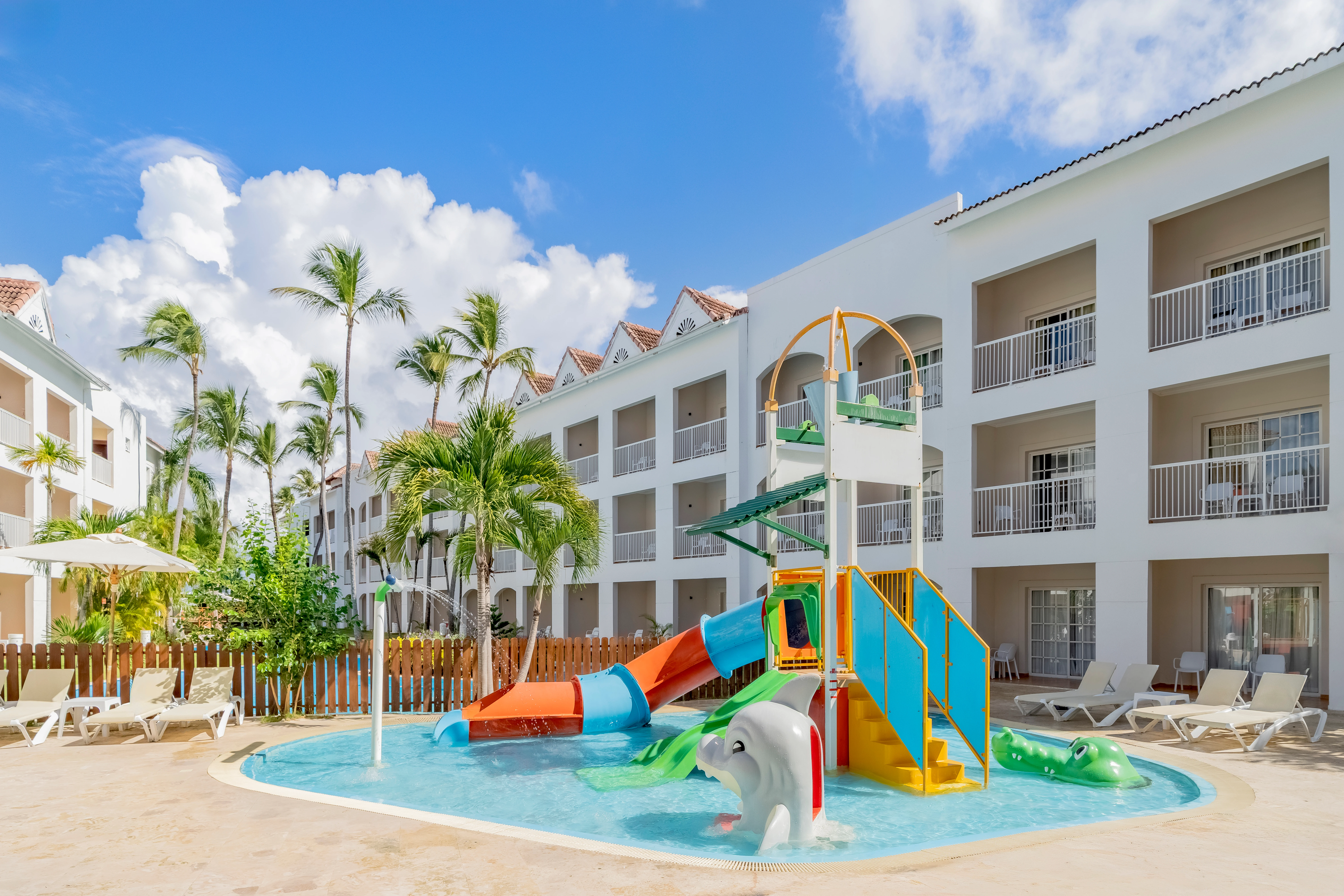 Colorful splash pool and kids water play area at Sunscape Coco Punta Cana Resort.