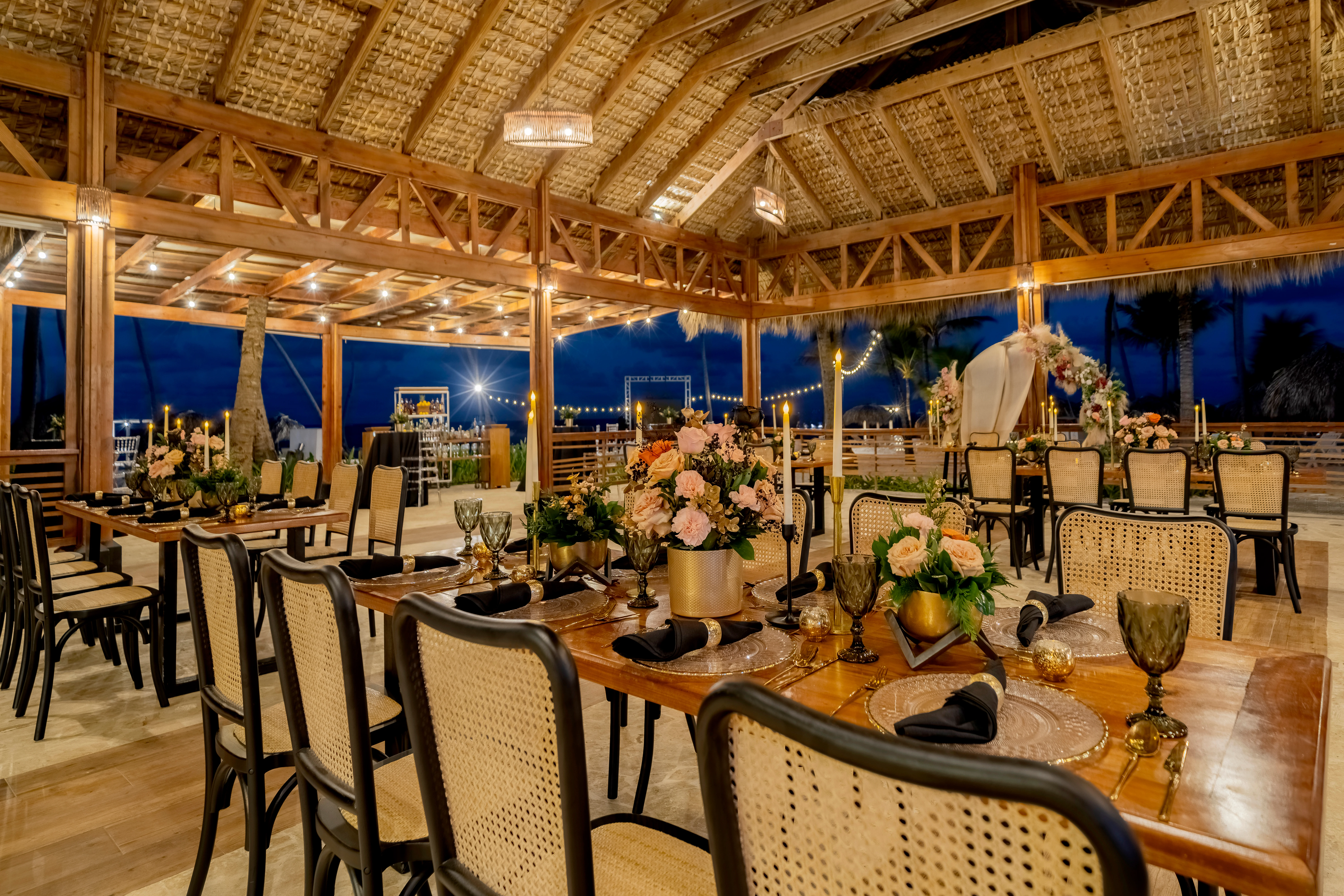 Elegant wedding reception inside a tropical open-air pavilion at Sunscape Coco Punta Cana Resort.
