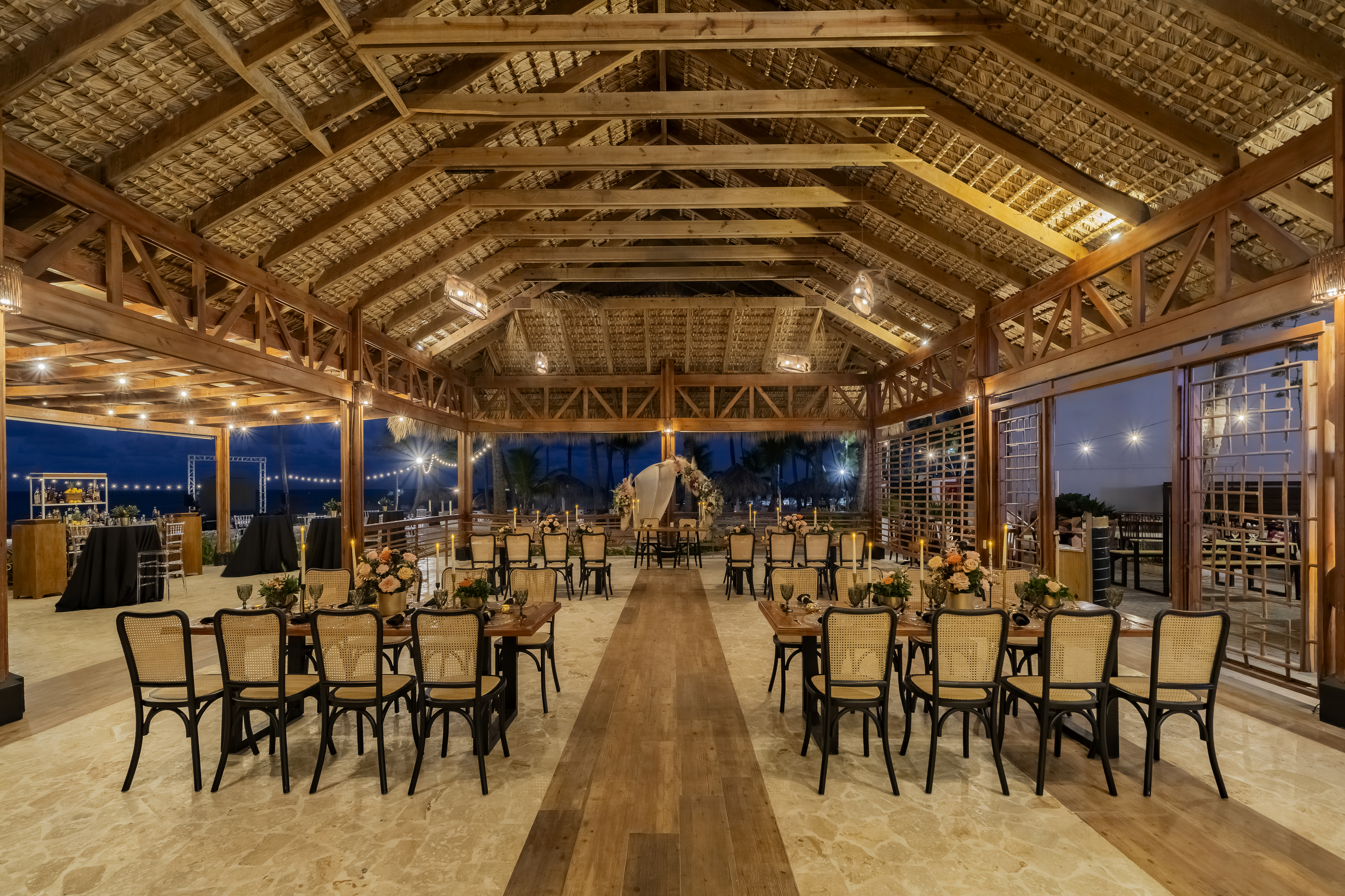 Elegant wedding reception setup inside a tropical pavilion at Sunscape Coco Punta Cana Resort.
