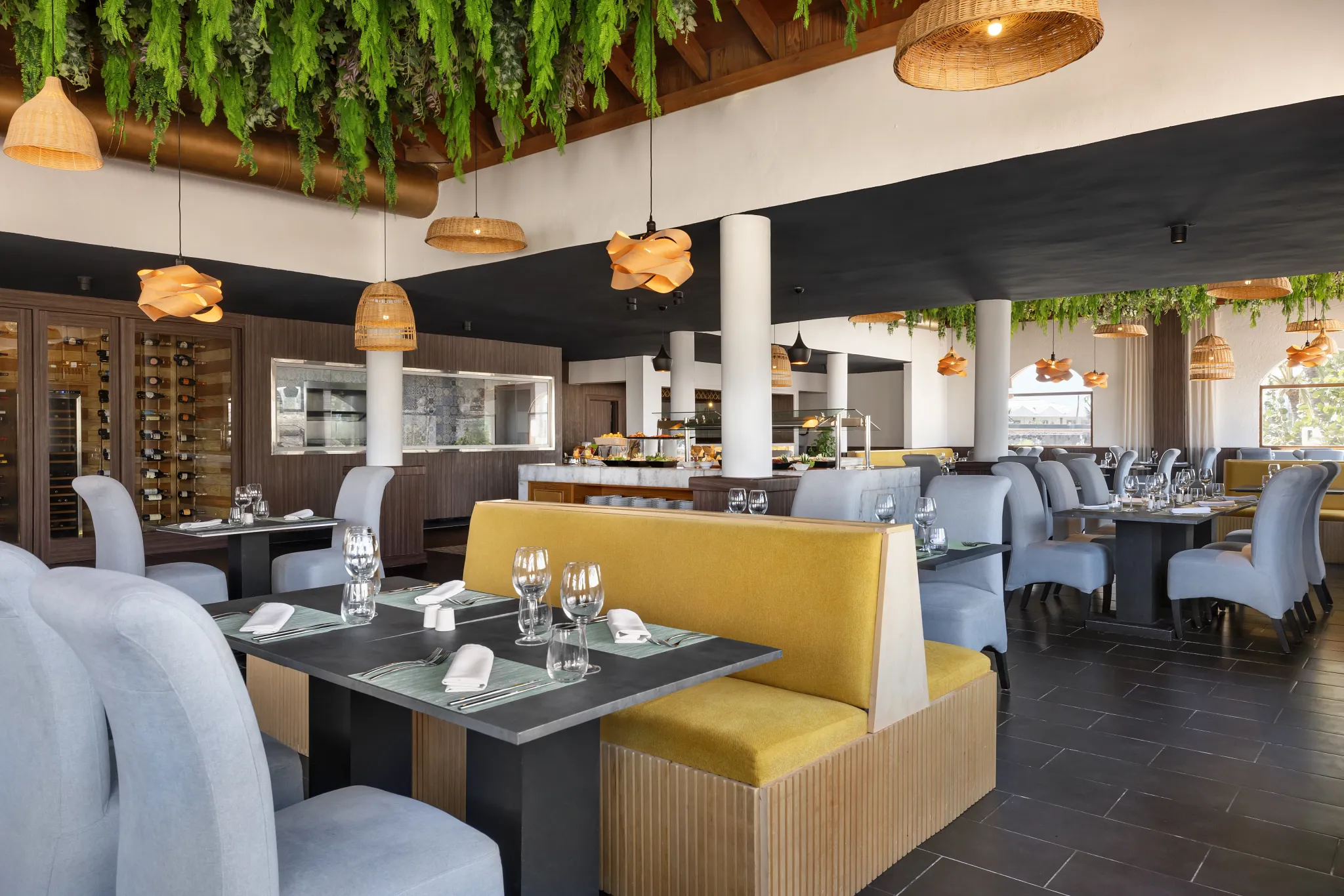 Tierra restaurant at Sunscape Coco Punta Cana featuring rustic Latin-inspired décor, warm lighting, and elegant dining ambiance.