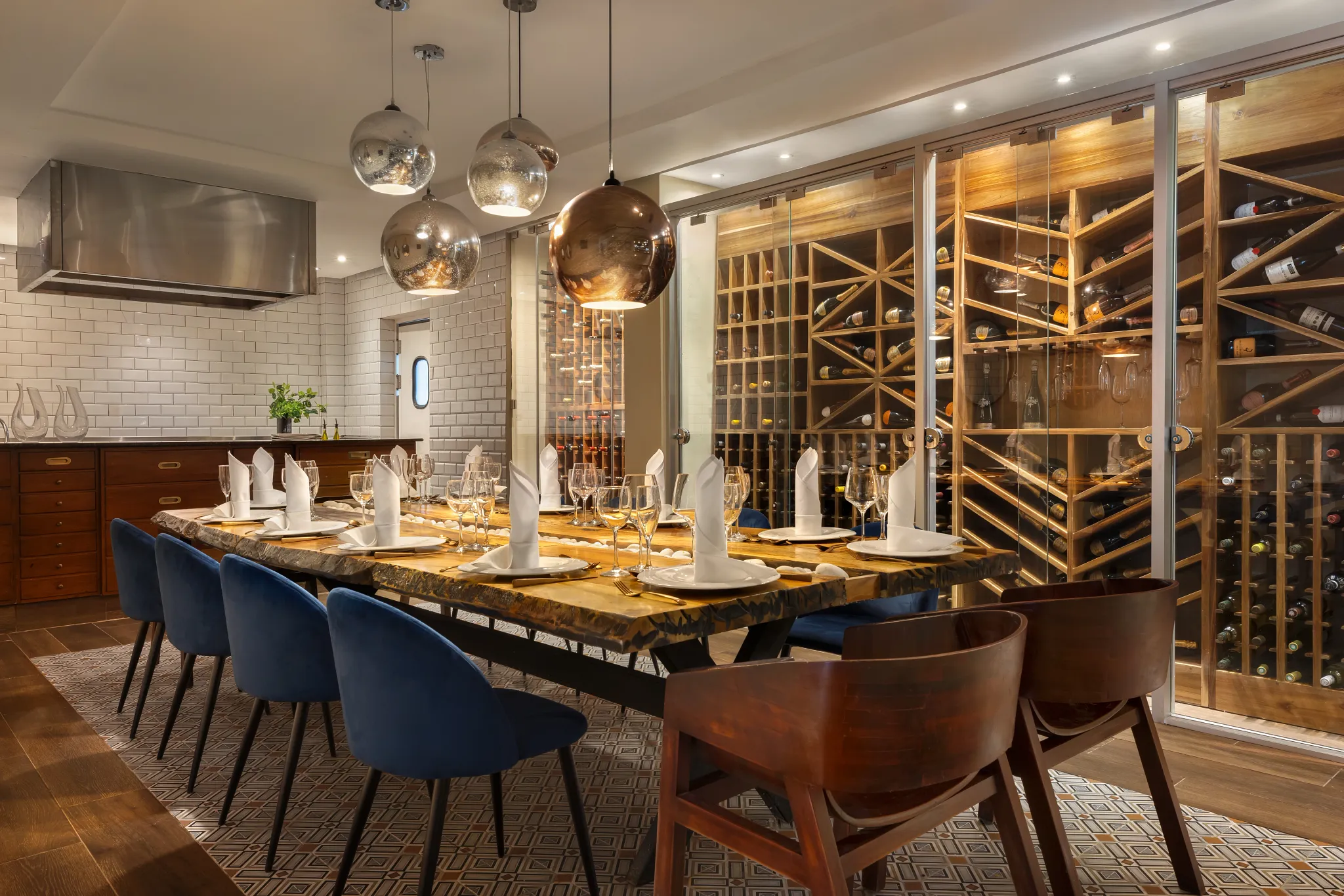 Un-Wined Cellar at Sunscape Coco Punta Cana featuring an intimate wine cellar atmosphere, elegant seating, and a sophisticated tasting experience.